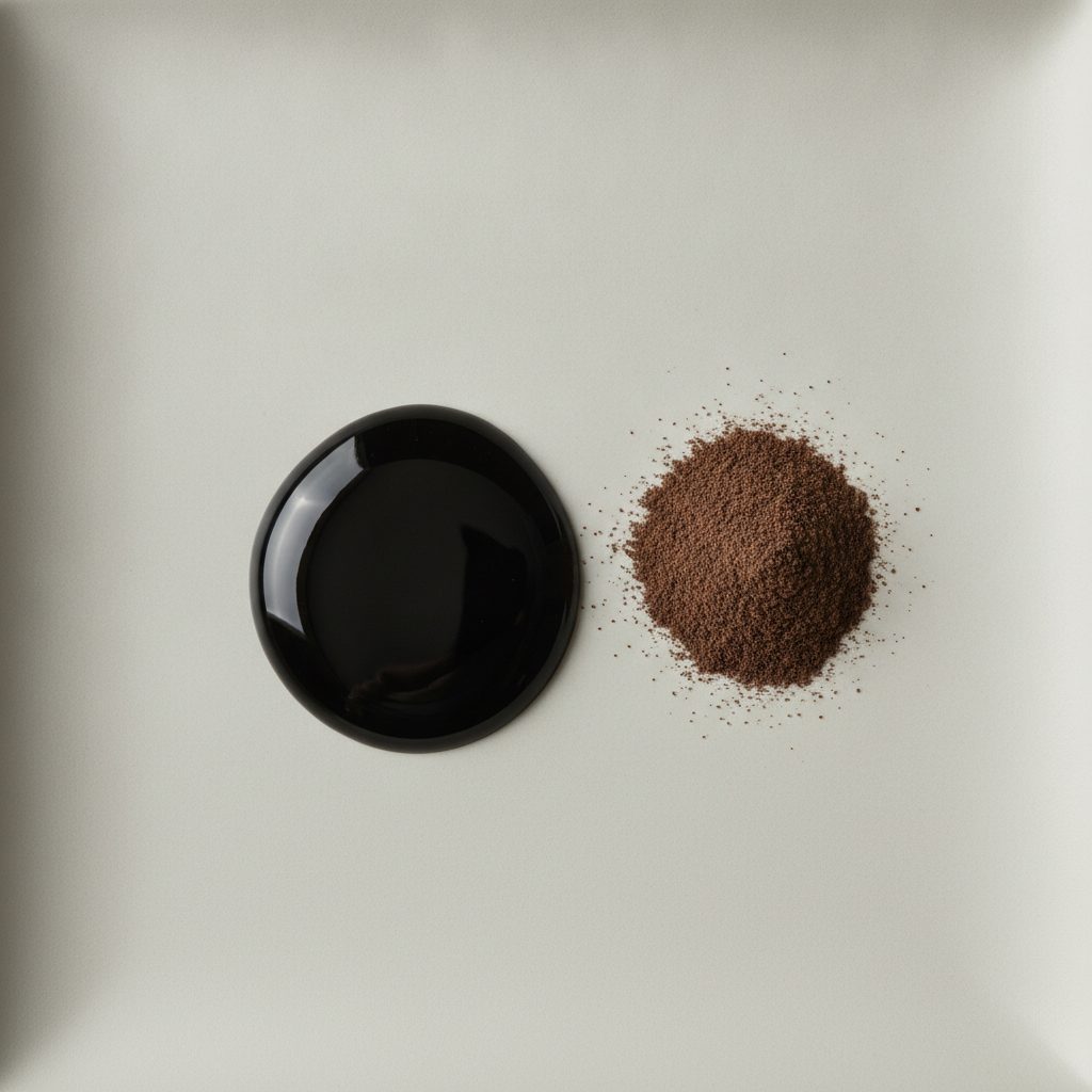 Glossy dark shilajit resin beside dark brown shilajit powder, comparing the two main shilajit forms